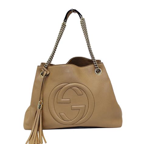 beige gucci soho